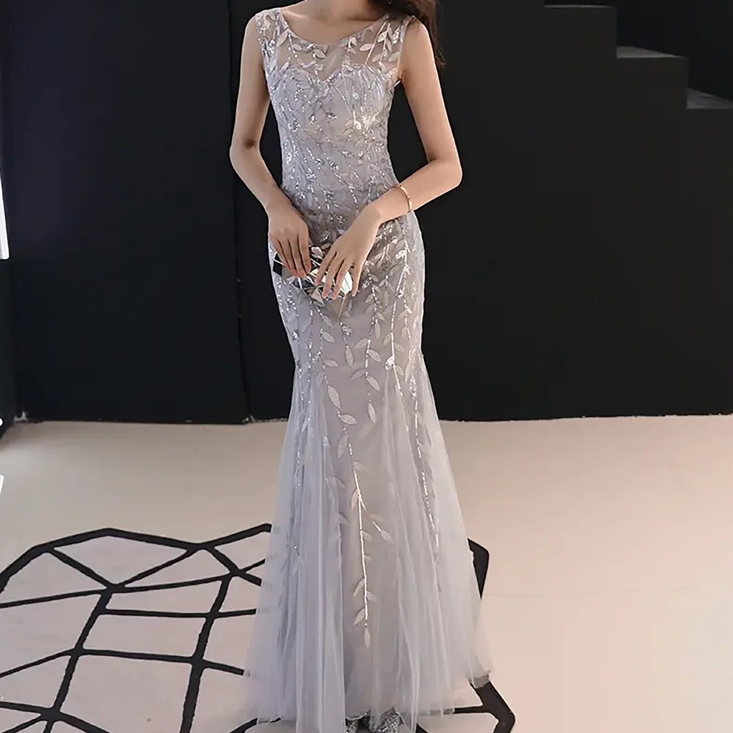 Sirhao Formalwear, namely, dresses, gowns, tuxedos, dinner jackets, trousers and footwear