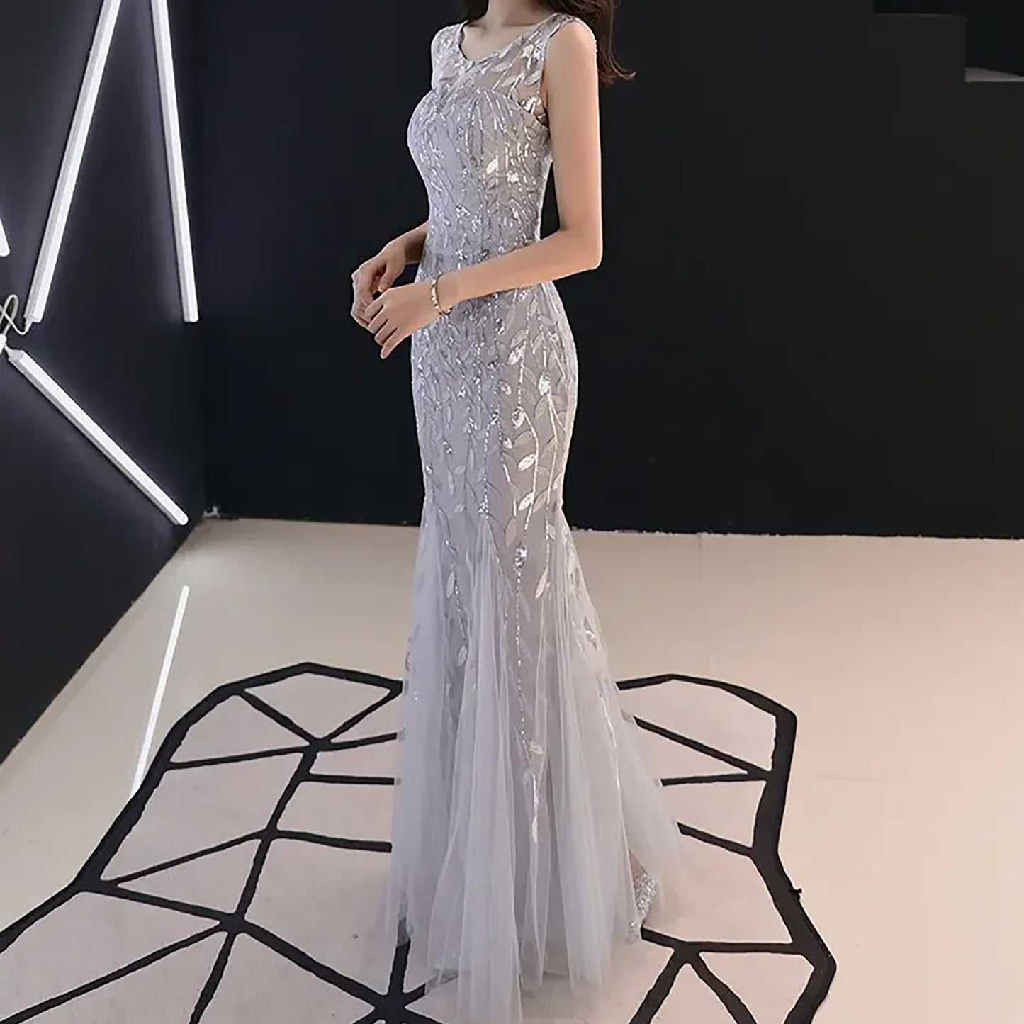 Sirhao Formalwear, namely, dresses, gowns, tuxedos, dinner jackets, trousers and footwear